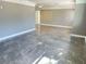 Spacious living room featuring neutral paint, recessed lighting, and tile flooring at 9 N Aurora Ave, Clearwater, FL 33765