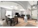 Open-concept living and dining spaces with tile floors, neutral tones, and recessed lighting at 918 W Knollwood St, Tampa, FL 33604