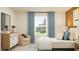 Serene bedroom with a side view and bright natural light at 9320 Bonita Mar Dr, Parrish, FL 34219