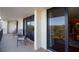 Spacious balcony with seating offers serene views of the surrounding landscape and partial water view at 100 Oakmont Ln # 605, Belleair, FL 33756
