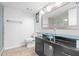 Modern bathroom with a unique glass bowl sink and glass-enclosed shower at 104 Anclote Rd # 104, Tarpon Springs, FL 34689