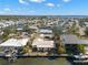 The perfect waterfront community, seen from above, showcasing canal access and the vibrant neighborhood at 10427 Spoonbill W Rd, Bradenton, FL 34209