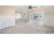 Open-concept living area boasts abundant space and water views from the windows at 10427 Spoonbill W Rd, Bradenton, FL 34209
