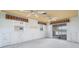Bright sun room with multiple windows, ceiling fans, and waterfront views perfect for relaxation at 10427 Spoonbill W Rd, Bradenton, FL 34209