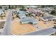 Aerial view of a well-kept single-Gathering home in a quiet residential neighborhood with mature trees at 1118 Excalibur St, Holiday, FL 34690
