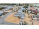 Aerial view of a well-kept single-Gathering home in a quiet residential neighborhood with mature trees at 1118 Excalibur St, Holiday, FL 34690