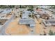 Aerial view of a well-kept single-Gathering home in a quiet residential neighborhood with mature trees at 1118 Excalibur St, Holiday, FL 34690