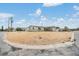 Wide exterior shot of the home at 1118 Excalibur St, Holiday, FL 34690