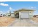 Charming single-story home featuring an attached garage and well-maintained landscaping at 1118 Excalibur St, Holiday, FL 34690
