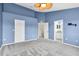 Bedroom featuring two closets, carpet, and neutral paint at 11266 Kapok Grand Cir, Madeira Beach, FL 33708