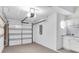 Spacious garage with shelving at 11266 Kapok Grand Cir, Madeira Beach, FL 33708