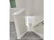 Carpeted stairs with wood railing at 11266 Kapok Grand Cir, Madeira Beach, FL 33708