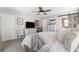 Charming main bedroom featuring soft, neutral colors and comfortable furnishings with ample natural light at 11790 88Th Ter, Seminole, FL 33772