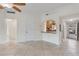 Open living room, featuring tiled floors, an archway, and lots of natural light at 1200 N Shore Ne Dr # 102, St Petersburg, FL 33701