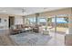 This living room is bright and spacious and has access to the outdoor patio at 1200 N Shore Ne Dr # 102, St Petersburg, FL 33701