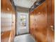 Community storage room with private locked cabinets and door to outdoor patio at 1200 N Shore Ne Dr # 102, St Petersburg, FL 33701
