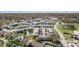 Extensive aerial view of the community showcasing mature landscaping, ponds, and ample parking at 12709 Raeburn Way, Tampa, FL 33624