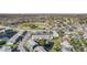 Scenic aerial view of the community with a pond, recreation areas, and attractive landscaping at 12709 Raeburn Way, Tampa, FL 33624