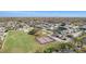 Comprehensive aerial view featuring community amenities, lush landscaping, playgrounds, and recreation areas at 12709 Raeburn Way, Tampa, FL 33624