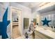 Bathroom featuring vanity sink with view into bedroom at 12709 Raeburn Way, Tampa, FL 33624