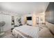 Bedroom featuring neutral walls, exercise equipment, and double closets at 12709 Raeburn Way, Tampa, FL 33624