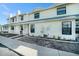 Inviting two-story condo with a charming front porch and well-maintained landscaping at 12709 Raeburn Way, Tampa, FL 33624