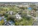 Aerial image of a residential area close to a golf course, with community features and lush greenery at 13502 Palmwood Ln # 13502, Tampa, FL 33618