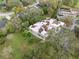Birds eye view of the property and surrounding landscape with mature trees at 13502 Palmwood Ln # 13502, Tampa, FL 33618