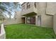 This home has an artificial turf backyard and exterior stucco at 13502 Palmwood Ln # 13502, Tampa, FL 33618