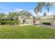 Two story townhome with large lawn and mature landscaping at 13502 Palmwood Ln # 13502, Tampa, FL 33618