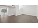 Spacious living room area with tile floors and stairs to the second floor at 13502 Palmwood Ln # 13502, Tampa, FL 33618