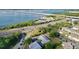 Scenic aerial view of the neighborhood near the highway, water, and bridge, offering a great location at 14 Seagrape Cir, Clearwater, FL 33759