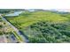 Scenic view of the surrounding area, showcasing the natural landscape and roadways at 14 Seagrape Cir, Clearwater, FL 33759