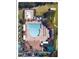Aerial view of the Oakstead community clubhouse and pool area, showcasing ample seating and recreational space at 19432 Haskell Pl, Land O Lakes, FL 34638