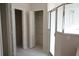 Bathroom featuring a glass enclosed shower stall and a door to a closet at 19432 Haskell Pl, Land O Lakes, FL 34638