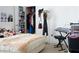 Bedroom with a bed, open closet, and keyboard with a stand at 19432 Haskell Pl, Land O Lakes, FL 34638