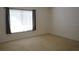 Bedroom featuring natural light, carpet flooring and a window at 19432 Haskell Pl, Land O Lakes, FL 34638