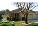 Charming single-story home featuring a well-maintained lawn and inviting curb appeal at 19432 Haskell Pl, Land O Lakes, FL 34638