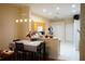 Eat-in kitchen featuring a dining table and white tile flooring at 19432 Haskell Pl, Land O Lakes, FL 34638