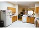 Another view of the kitchen area showing the countertops and appliances at 19432 Haskell Pl, Land O Lakes, FL 34638