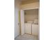 Closet laundry space with white washer and dryer units at 19432 Haskell Pl, Land O Lakes, FL 34638