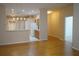 Spacious living area seamlessly connects to the kitchen, with open layout and natural light at 19432 Haskell Pl, Land O Lakes, FL 34638