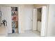 Pantry with organized shelving and a closet with a washing machine at 19432 Haskell Pl, Land O Lakes, FL 34638