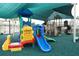 Community playground with multiple slides and climbing structures, perfect for children of all ages at 19432 Haskell Pl, Land O Lakes, FL 34638