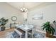 Bright dining area with a modern chandelier and ample natural light at 2443 Nantucket Harbor Loop, Sun City Center, FL 33573