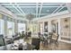 Elegant dining area featuring chandeliers and natural light at 34159 Astoria Cir, Wesley Chapel, FL 33545