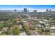 Stunning aerial shot featuring the city skyline and tree-lined neighborhood at 3419 W Empedrado St, Tampa, FL 33629
