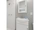 Bathroom featuring a white vanity, chrome faucet, and tiled shower at 3419 W Empedrado St, Tampa, FL 33629