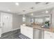 Open kitchen features stainless steel appliances, granite countertops, and an entryway at 3419 W Empedrado St, Tampa, FL 33629