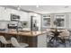 Bright kitchen features stainless steel appliances, granite countertops, and stylish breakfast bar at 3419 W Empedrado St, Tampa, FL 33629